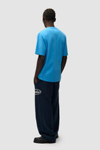 Laden Sie das Bild in den Galerie-Viewer, Arte Antwerp -Circle Logo Cut T-shirt - BLUE T-Shirts Arte Antwerp
